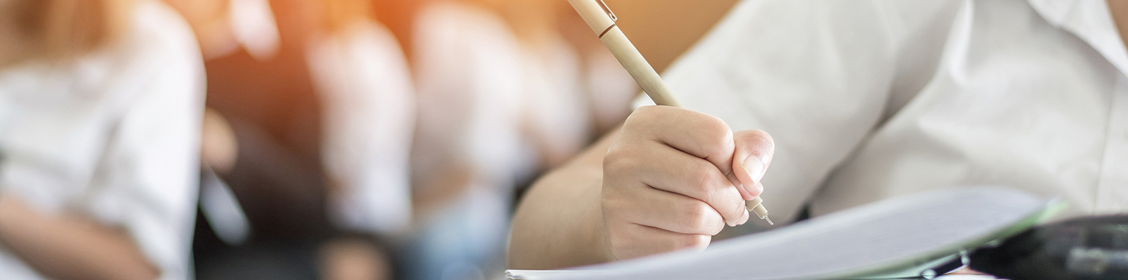 Exam at school with student’s taking educational admission test